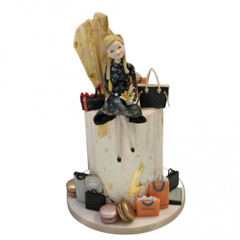DRIP CAKE WITH CARTOON STYLE FIGURE